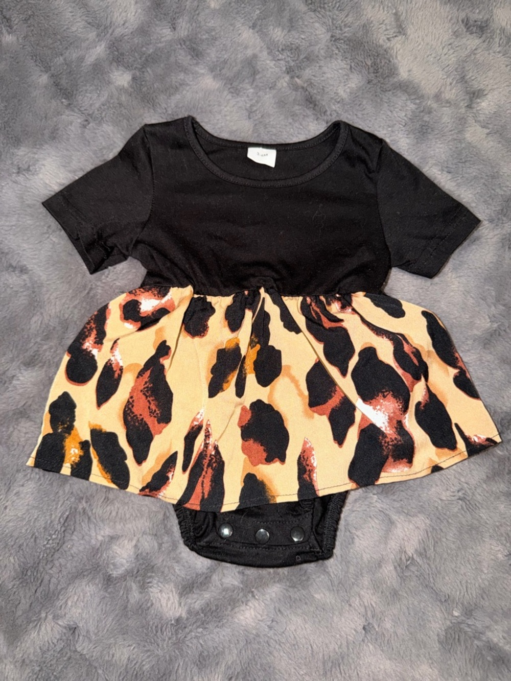 Black Top with Leopard Print Skirted Bodysuit